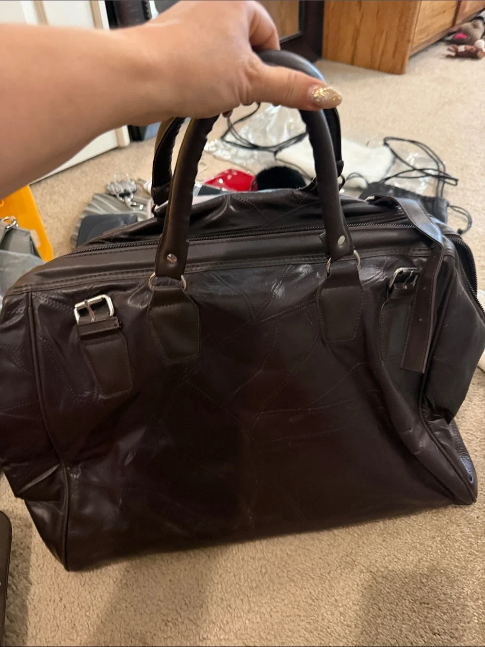 Men's Brown Leather Weekender Bag leather.